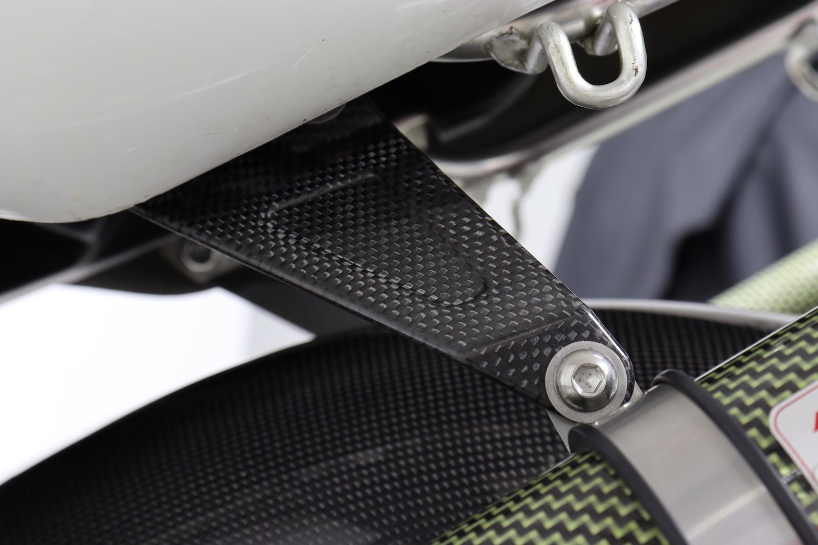 Exhaust Hanger Stay Left, Carbon, RGV250, VJ23 - Image 3